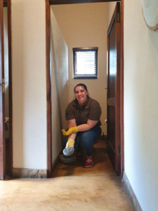 Angelique stripping floors