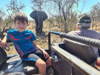 Martin and his grandfather Etienne Snr with an elephant