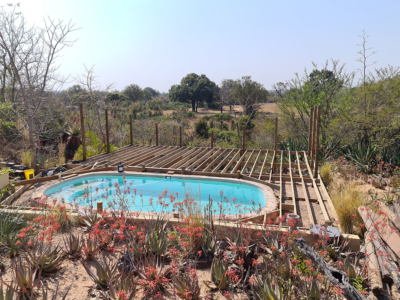 Original camp swimming pool deck under construction